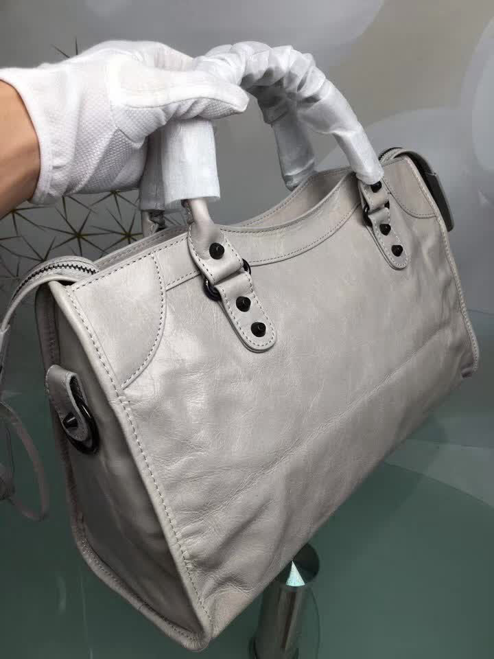 BALENCIAG巴黎世家 經典款 義大利進口原版油蠟頭層牛皮 古銅釘黑色 時尚百搭 手提肩背斜挎包  BL1312